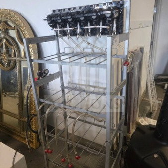 Soda fountain rack with multiple nozzle dispensers, McCann's carbonator included, metal frame, good condition.