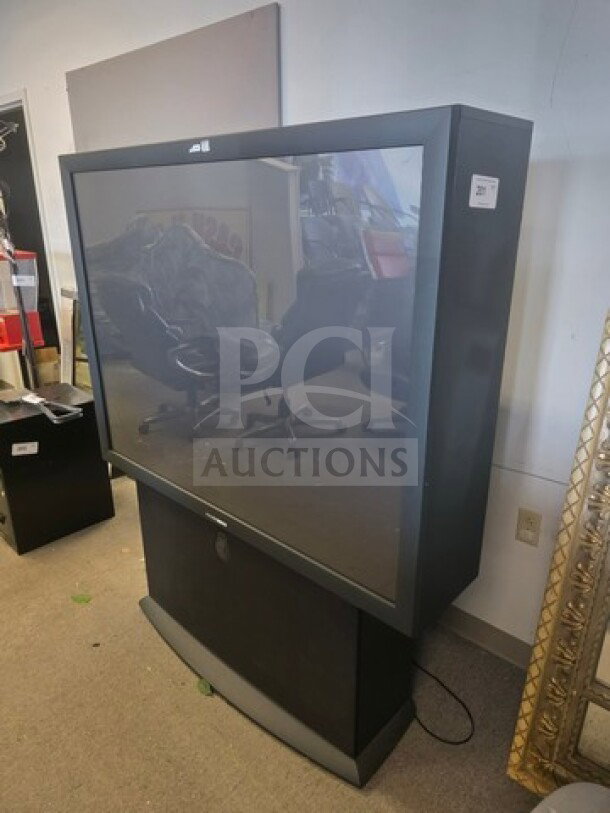 Philips Magnavox rear projection TV, unknown working condition, sold as is, with visible screen and cabinet.