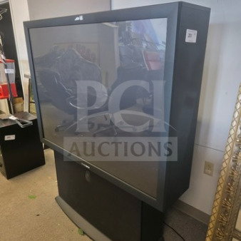 Philips Magnavox rear projection TV, unknown working condition, sold as is, with visible screen and cabinet.