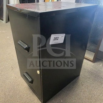 Black two-drawer filing cabinet, metal, used condition, some surface scratches. Label reads "202".