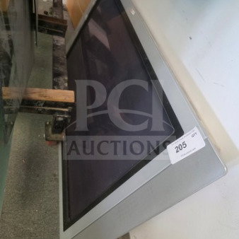 Philips flat screen TV, unknown working condition, silver frame, sold as is, auction tag "205" visible.