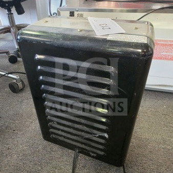 Comfort Zone portable electric utility heater, black, vented front, unknown working condition, sold as is.