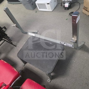 Deadlift platform by Flax Fitness, sturdy frame, rubberized base, slight wear. Branding visible on structural bar.