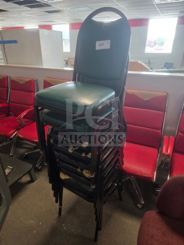Lot of 9 stackable chairs, green upholstery, metal frame, shows signs of wear. Tag reads "222".