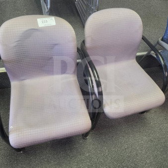 Lot of 2 office chairs with light fabric upholstery, black armrests, and minor wear. Numbered tags visible: 233, 234.