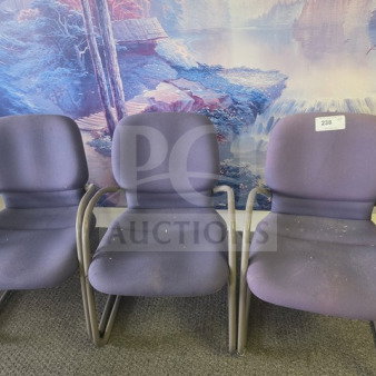 Lot of 3 purple office chairs with metal frames, fabric upholstery, and minor wear. Label marked "238" on one chair.