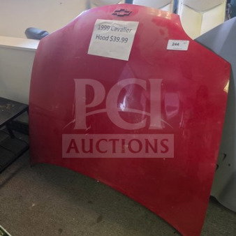 Red 1999 Cavalier hood for sale, priced at $39.99. Visible label attached with item name and price. In used condition.