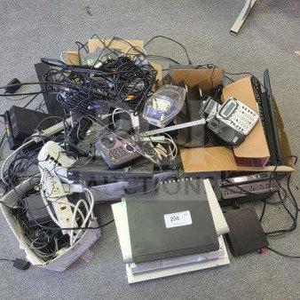 Lot of miscellaneous electronics; includes cables, routers, phone, remote, and power strips. Various conditions and models. Label marked "250".