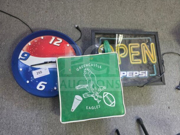 One lot of miscellaneous items; includes Pepsi-themed clock, neon open sign, and Greencastle Eagles pizza delivery bag.