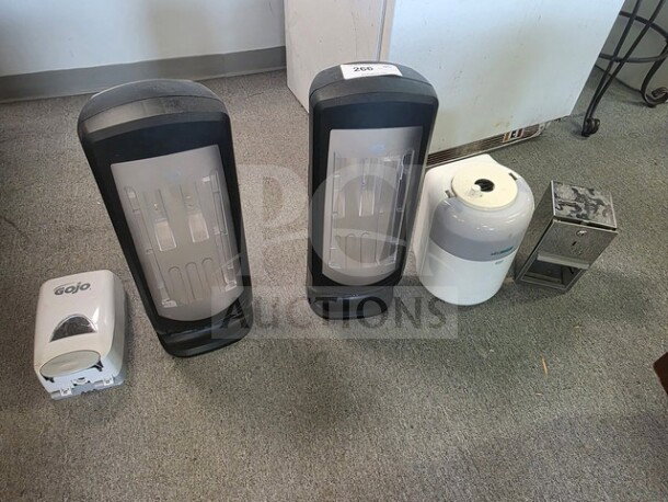 One lot of miscellaneous dispensers, including Gojo brand; various sizes and conditions; ideal for commercial use.
