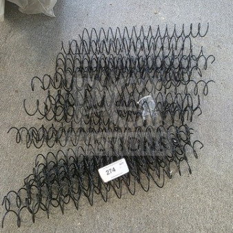 Lot of black wire spiral coils in good condition, displayed on a gray surface. Auction tag reads "274."
