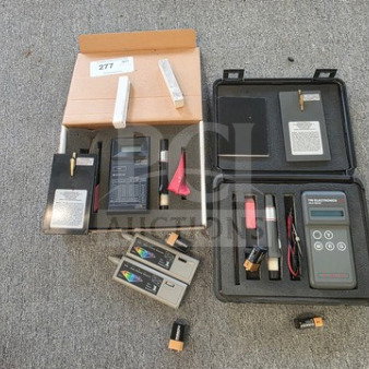 Lot of miscellaneous gold testers, various brands, featured in open cases. Sold as is, untested condition.