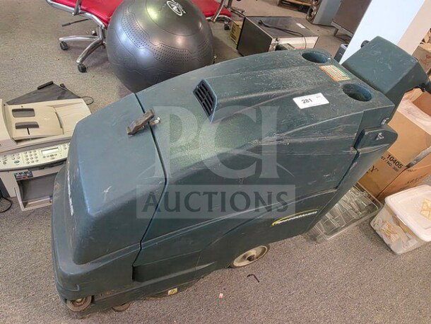 Tennant Nobles SpeedGleam walk-behind floor scrubber, dark green, used condition, model tag visible, serial number 281.