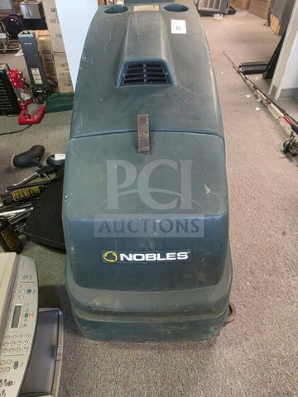 Tennant Nobles SpeedGleam walk-behind floor scrubber, used condition, visible Nobles logo, suitable for commercial use.