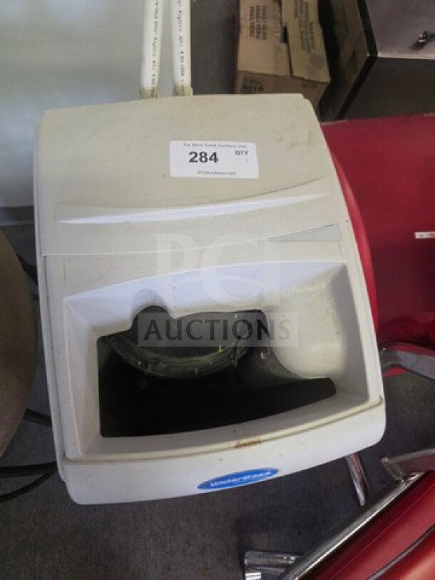 Water Boss water softener, model unknown, shown with a label marked "284", in used condition with visible wear.