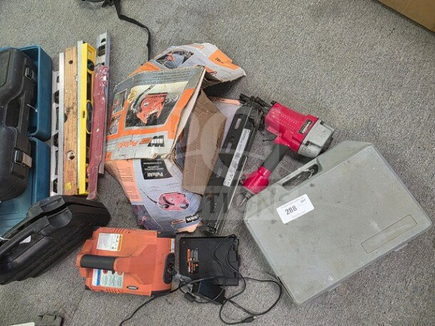 Lot of miscellaneous tools including levels, power tools, cases, and accessories. Sold as is, visible wear and labels present.