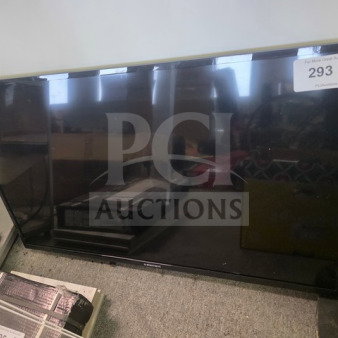 Element flat screen TV, unknown working condition, sold as is. Auction tag labeled "293".
