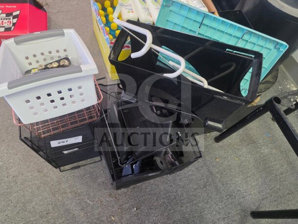 A collection of various baskets and desk organizers, including plastic and wire designs, stacked on a carpeted floor.