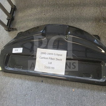 1995-1999 Eclipse carbon fiber deck lid, excellent condition, textured finish; price tag reads $169.99.