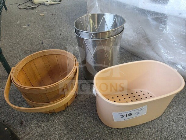 Assorted baskets and bins including a wooden basket, two metallic bins, and a plastic bin labeled "316."