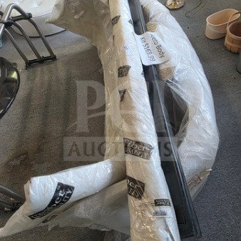 Alero Body Kit wrapped in protective packaging, includes multiple parts, labeled with "FRP Quality," appears new and unused.