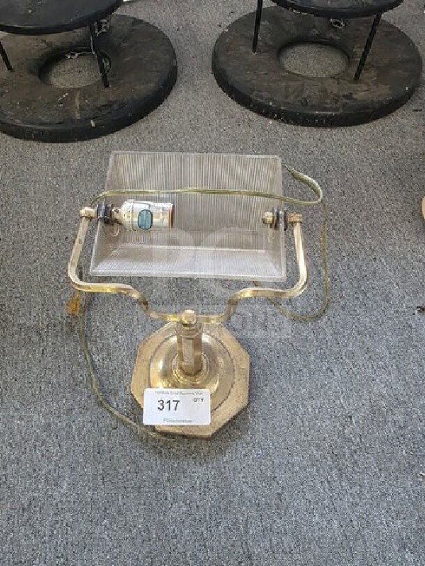 Brass desk lamp with rectangular glass shade, visible bulb, on an octagonal base. Marked with auction tag #317.
