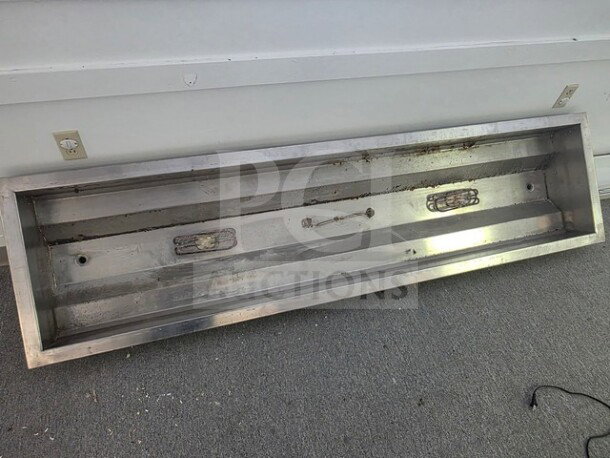 8-foot stainless steel hot water pan, used, features heating elements and plug. Some wear visible on interior surfaces.