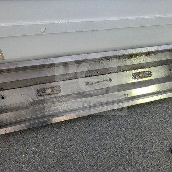 8-foot stainless steel hot water pan, used, features heating elements and plug. Some wear visible on interior surfaces.