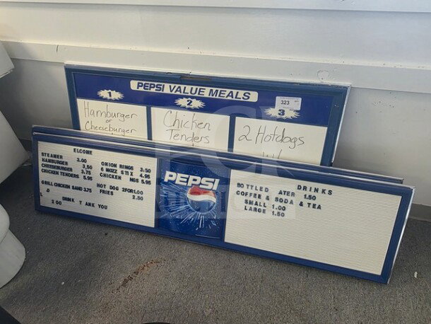 Lot of 3 vintage Pepsi menu signs, featuring interchangeable slots and handwritten food items. Signs include "Pepsi Value Meals" with pricing details. Signs show wear consistent with age and use.