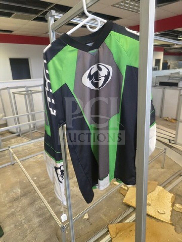 Motocross jersey, green and black with bull logo, long sleeves, hanger display. Good condition.