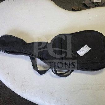 Esteban Midnight Legacy Electric Guitar in soft case, black. Sold as is. Case shows wear with visible auction tag labeled "334".