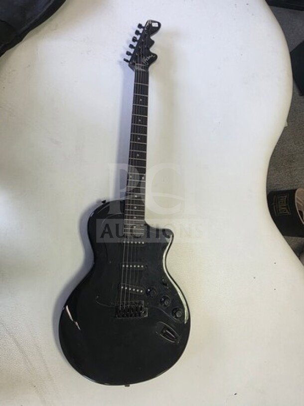 Esteban Midnight Legacy Electric Guitar, black, includes soft case. Visible wear; sold as is. Six strings, detailed body design.