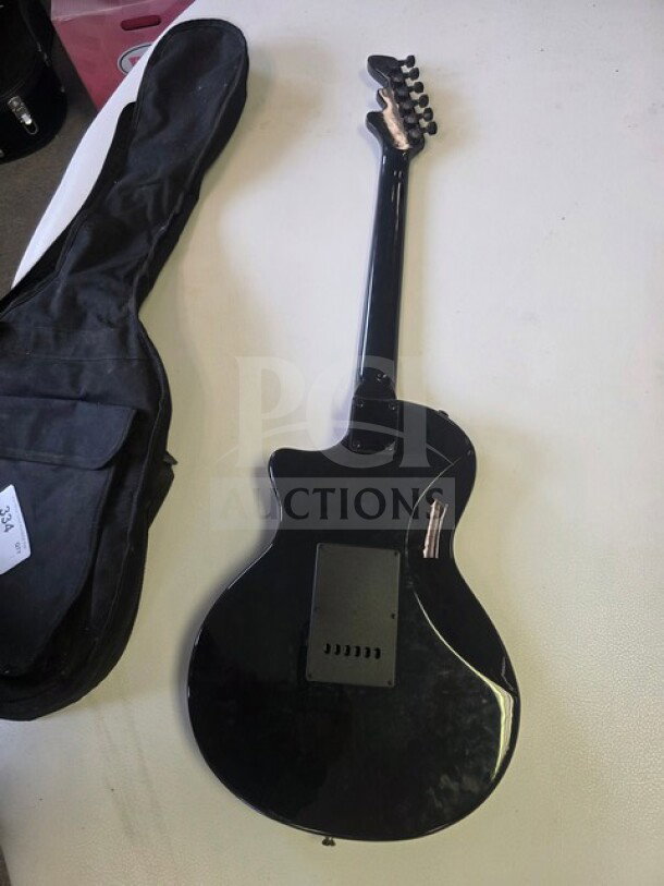 Esteban Midnight Legacy Electric Guitar with soft case, black finish, back view, fair condition, sold as is.