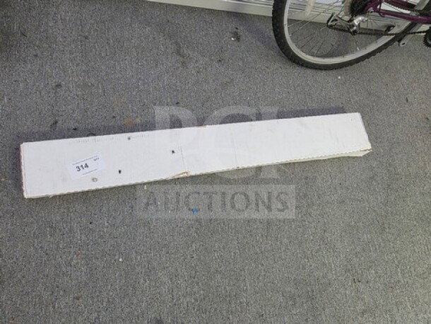 Boxed CLX Table Rock Oak flooring, 5mm with pad, showing label "314." Box appears slightly worn.
