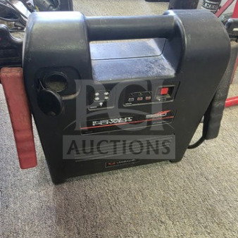 Instant Power 950 Portable Jump Starter, black, with LED indicators, built-in handle, and charging ports; used condition.