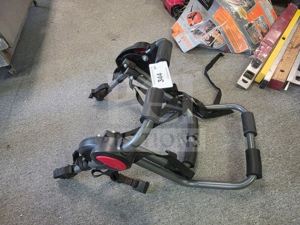 Bell Cantilever 200 2-Bike Trunk Rack in good condition, with adjustable straps and padding, tag labeled "344."