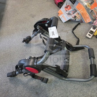 Bell Cantilever 200 2-Bike Trunk Rack in good condition, with adjustable straps and padding, tag labeled "344."