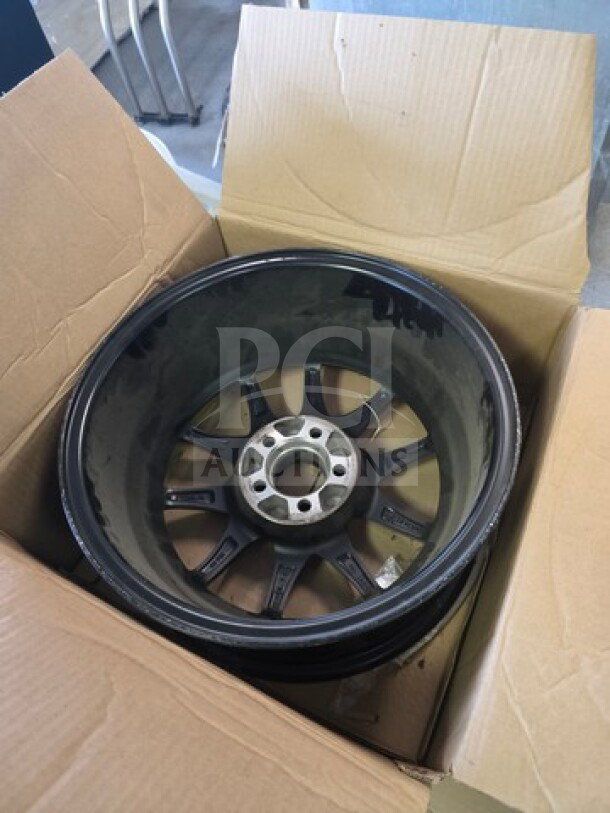 Lot of 4 SSC Performance Wheels in a cardboard box. Black alloy rims with multi-spoke design, in good condition.