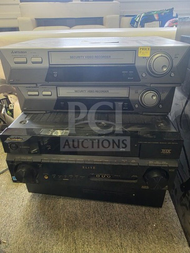 Lot of miscellaneous electronics including Mitsubishi security video recorders and Pioneer Elite audio receiver; sold as is.