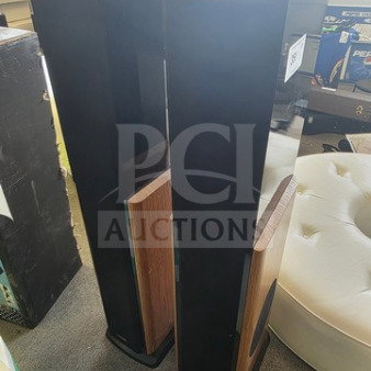 Polk Audio LSi15 Tower Speakers, black and wood finish, sold as is, visible wear on the surface.