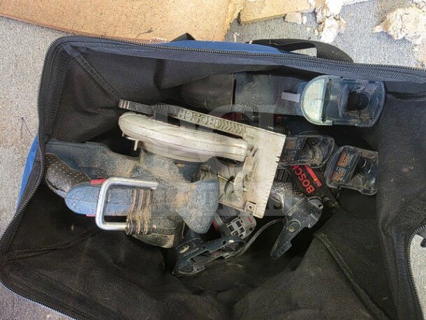 Lot of miscellaneous Bosch power tools, visibly used, in a black carry bag, sold as is.