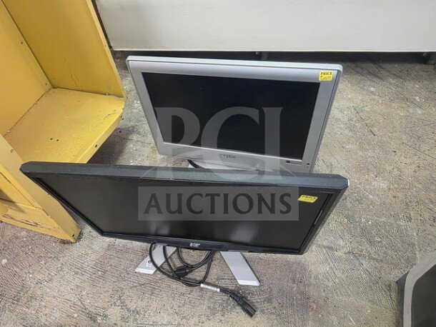 Lot of 2 computer monitors, different models, black and silver frames, visible wear, sold as is, with attached cables.