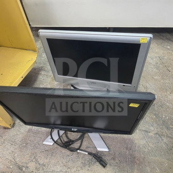 Lot of 2 computer monitors, different models, black and silver frames, visible wear, sold as is, with attached cables.