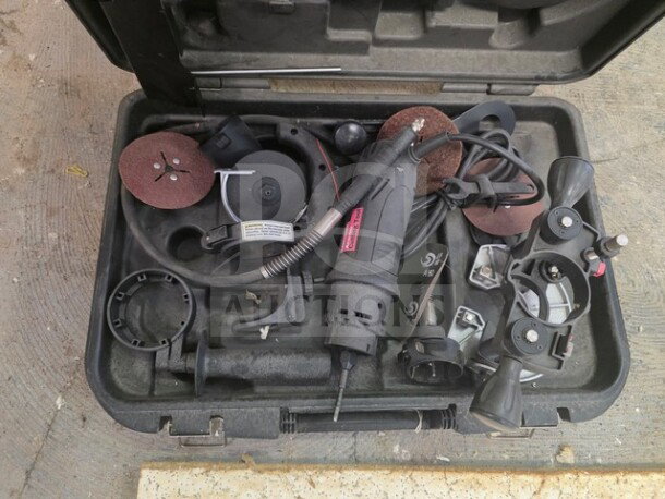 Craftsman All-In-One Cutting Tool kit in black case, includes various attachments and discs. Sold as is, used condition.