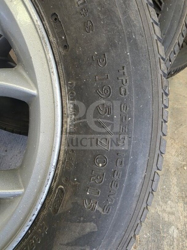 Lot of 4 Goodyear tires, size P195/70R15, visible wear, sold as is.