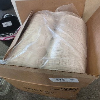 Box of molded fiber 9" x 7" white trays, packed in plastic. Tray edges visible, labeled "Lot 372," new condition.