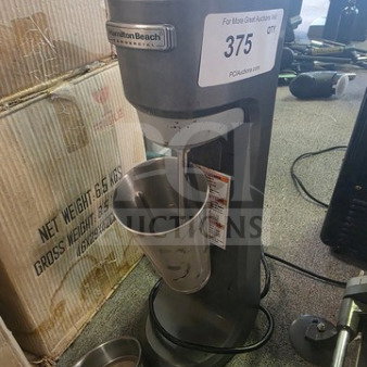 Hamilton Beach Commercial HMD200 Drink Mixer, gray, used condition, with stainless steel cup and visible power cord.