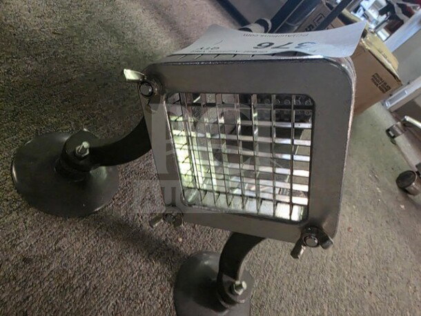 Commercial French Fry Cutter, stainless steel grid, sturdy suction cup feet, used condition, auction tag visible.