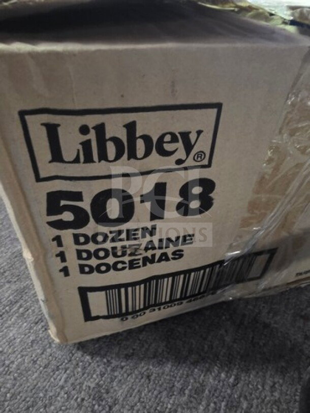 Libbey 5018 box with 1 dozen 14oz glass mugs, sealed. Box shows "1 Dozen" in English, French, and Spanish.