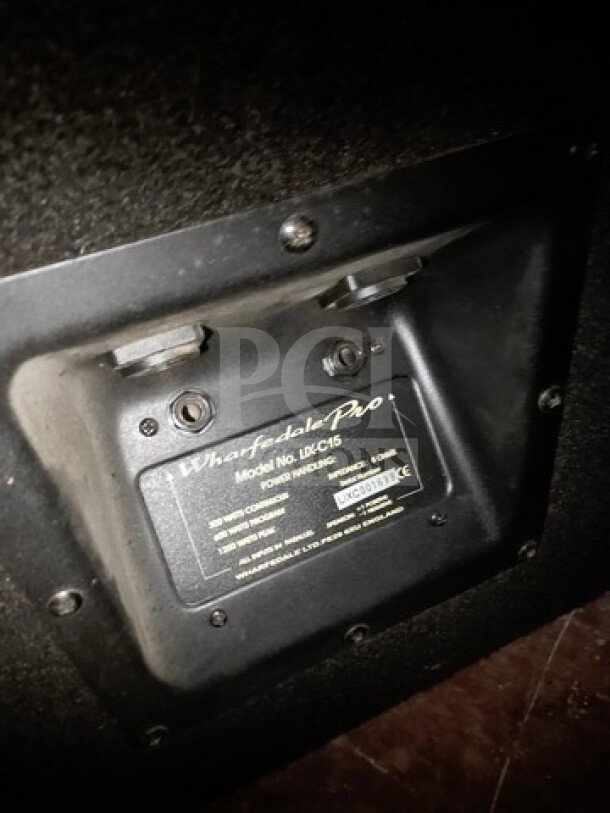 Lot of 2 speakers; visible is Wharfedale Pro, Model No. LX-C15, used condition, sold as is.